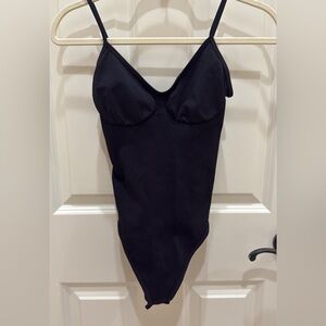 Sleek and simple black body-shaping bodysuit, size‎ small.